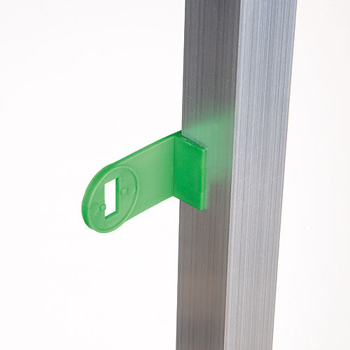 Green clip attached to greenhouse pole