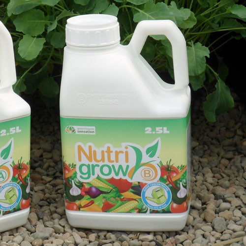 A bottle of nutri-grow plant feed