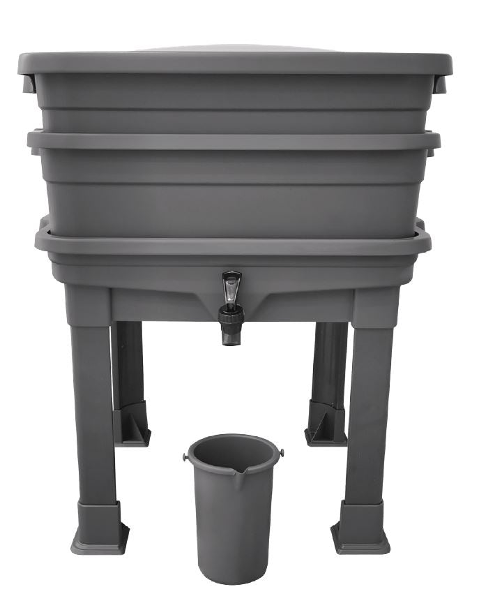 Gray plastic washing machine with a smaller bucket on a white background