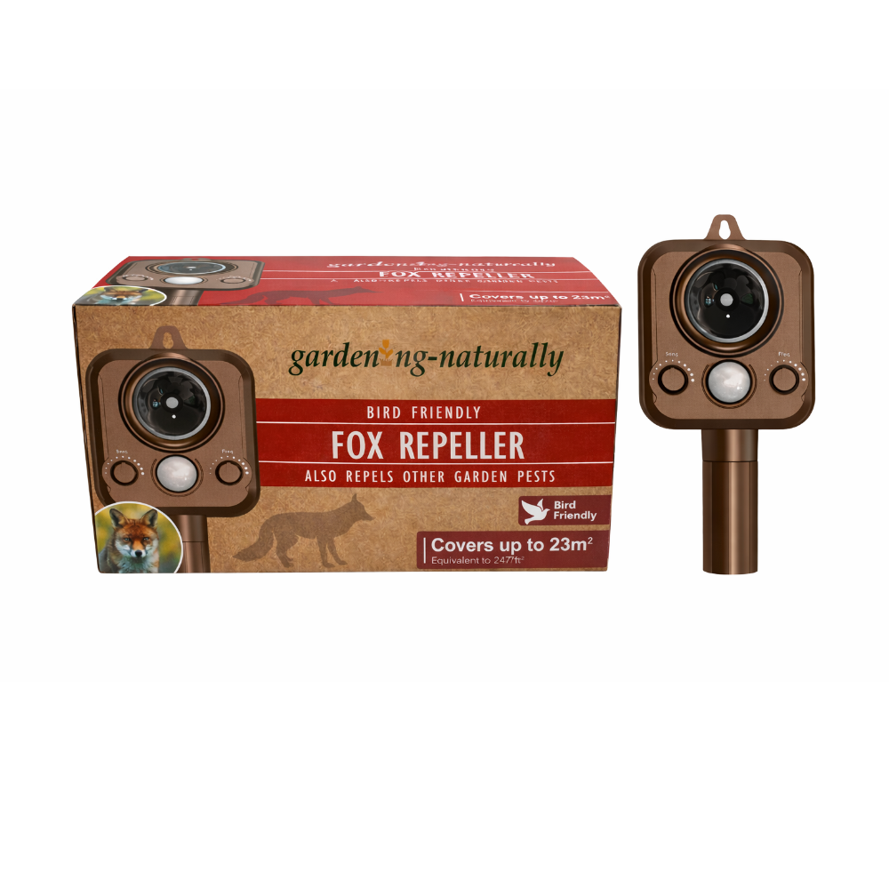 Fox repeller with packaging on a white background