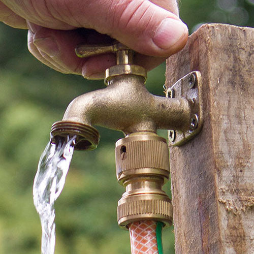 Go anywhere brass tap on wooden pole