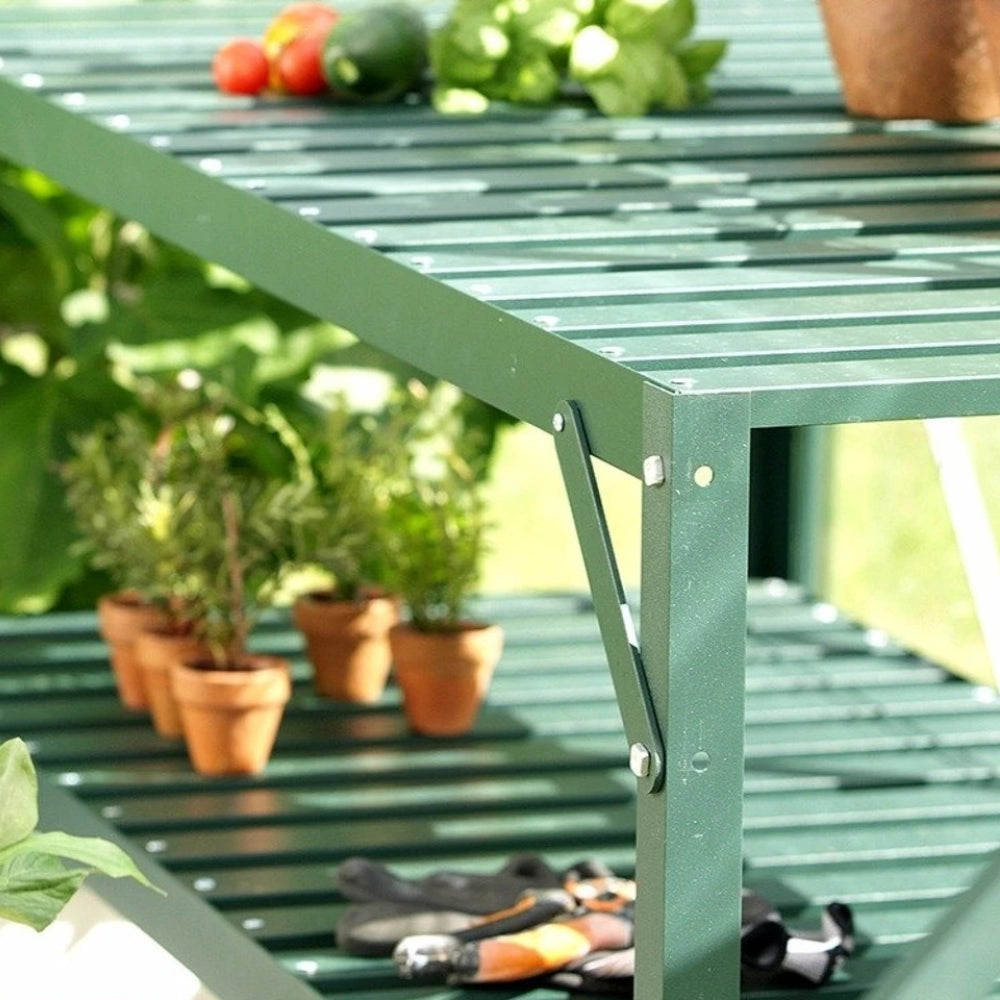 powder coated green staging bolted together