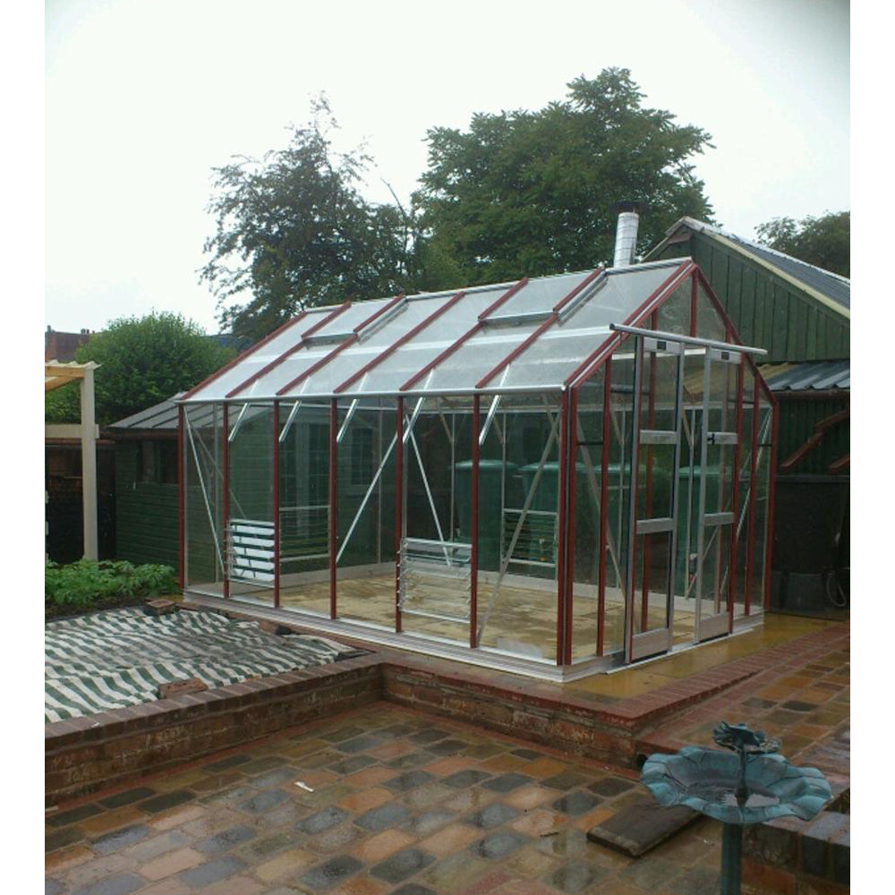 side angle of red powder coated greenhouse