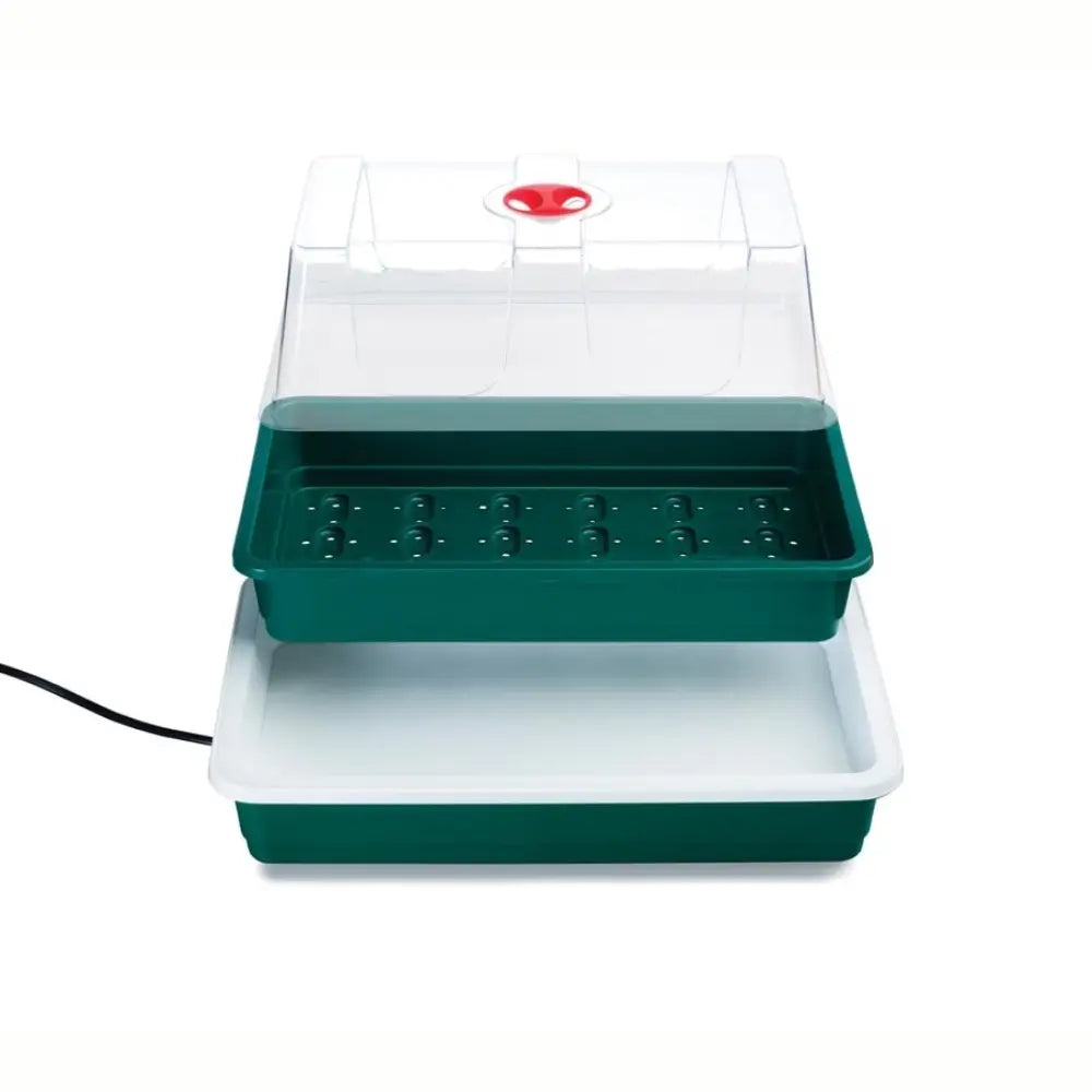 Green and white electric propagator seedling tray with transparent lid