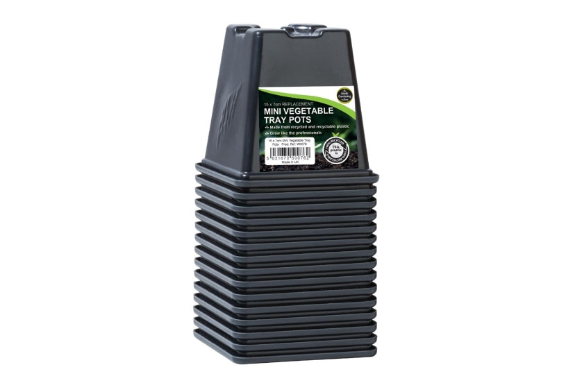 Stack of black mini vegetable tray pots