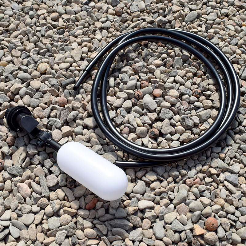 quadrow float valve and pipe on stones