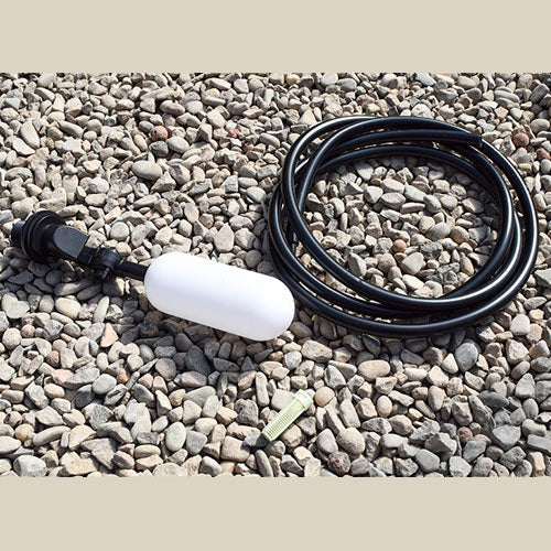 quadgrow float valve on a stone background