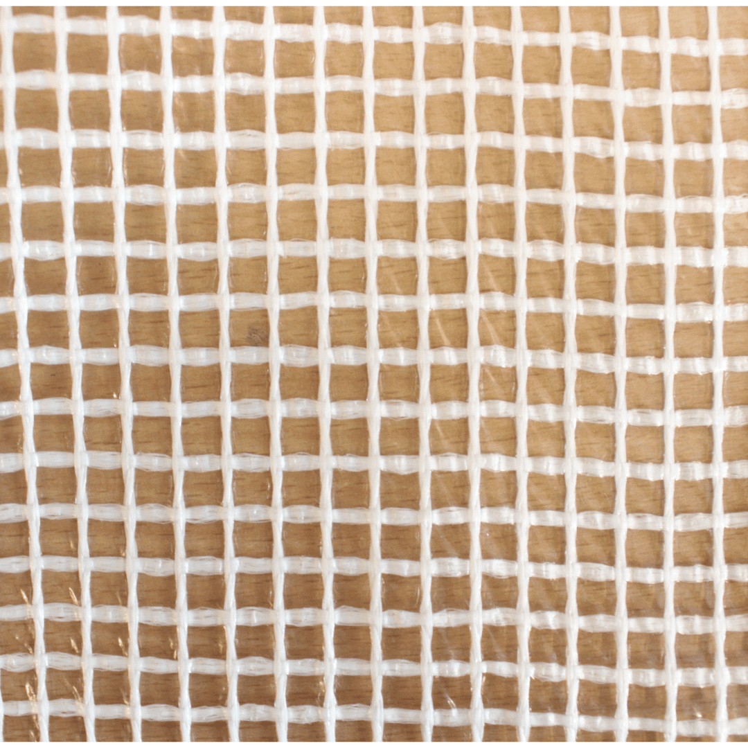 polythene netting on a table with white squares
