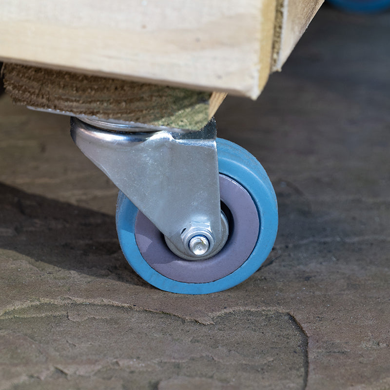 blue wheels on a planter