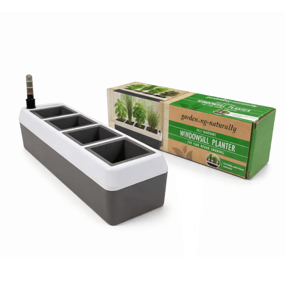 Gray self-watering windowsill planter with a green box labeled gardening naturally