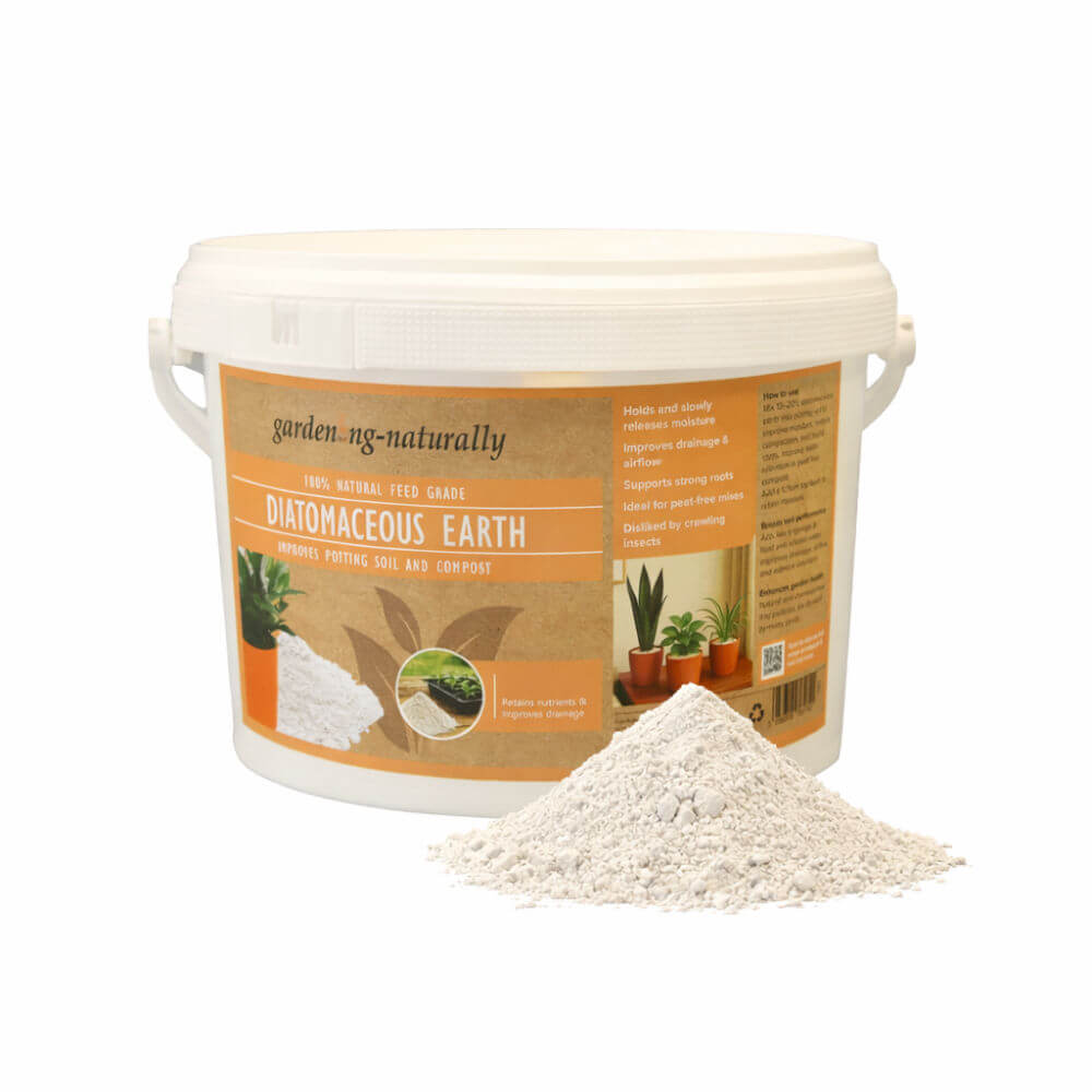 Container of garden naturally diatomaceous earth with a small pile on a white background
