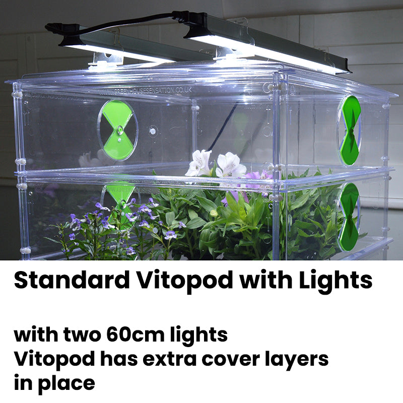 Vitopod propagator with led lights and two extra cover layers in place with seedlings inside