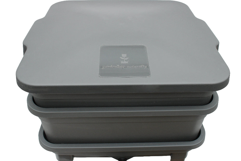 Stack of gray gardening pots with a brand logo on a white background