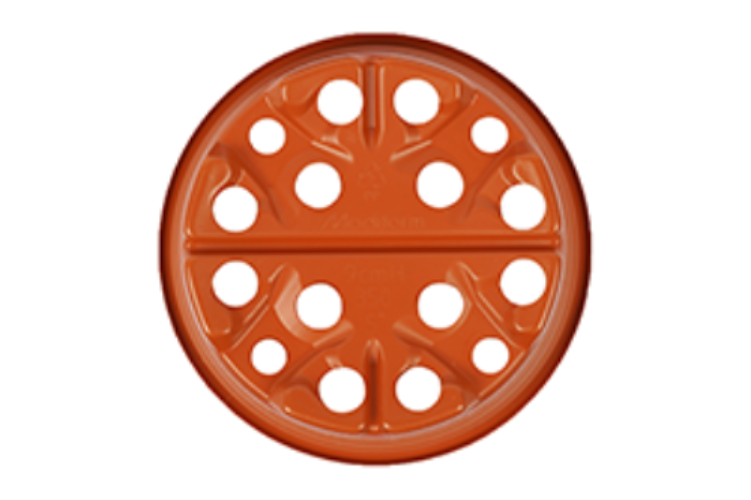 Round brown plastic object with multiple holes on a white background