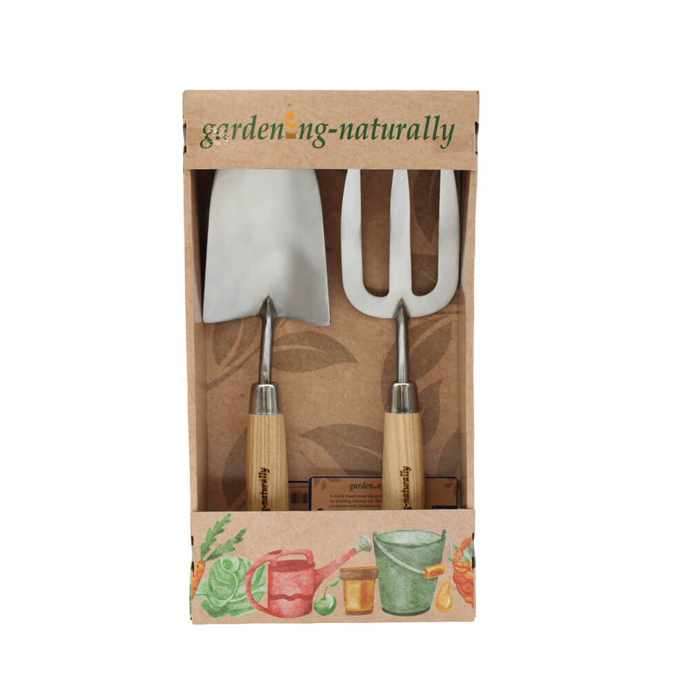 Set of gardening tools in a box with 'garden.naturally' branding on a white background.