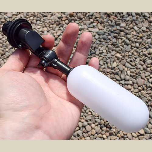 quadrow float valve being held in a hand