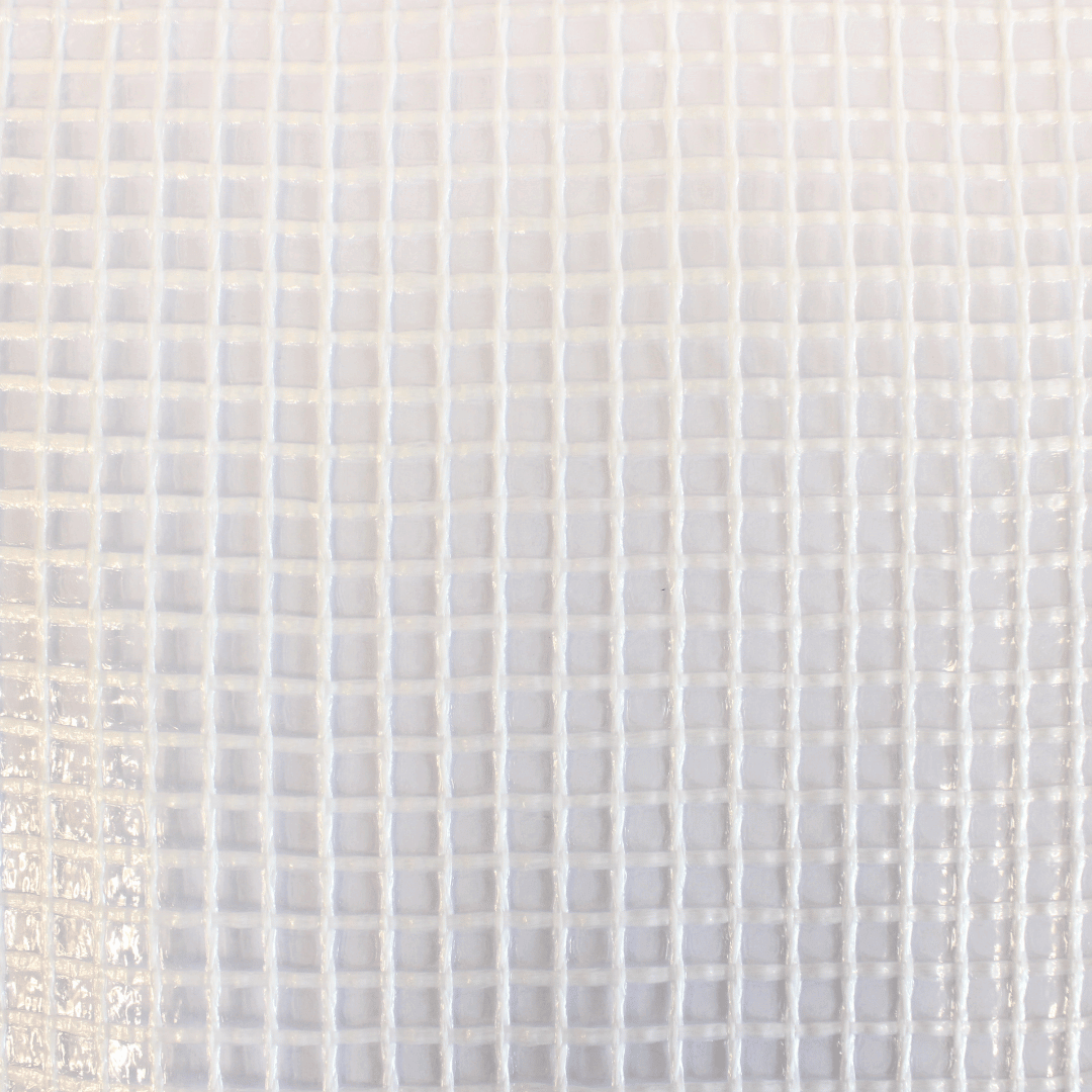 Close-up of a textured white polythene netting with a grid pattern