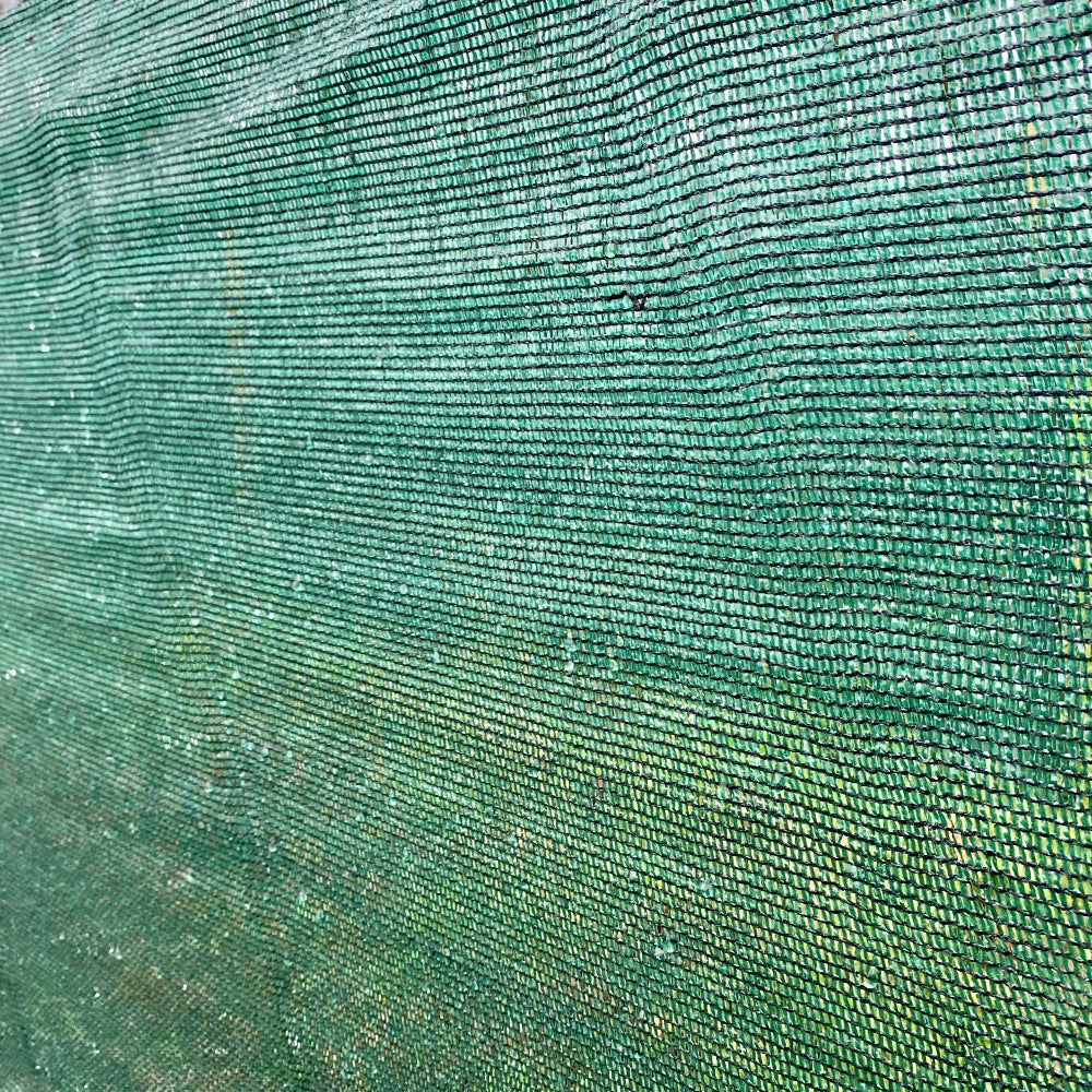 Close-up of green wind break netting